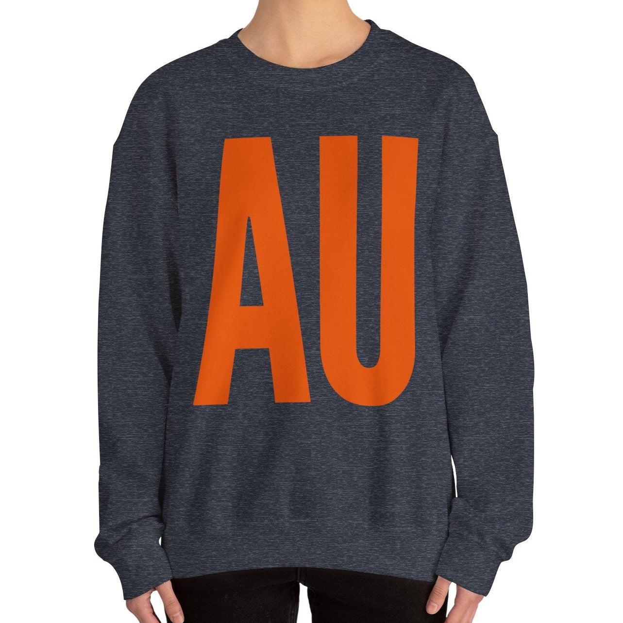 Person wearing a dark gray sweatshirt with 'AU' in orange on a white background