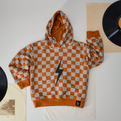 THE CHECKERED SPARK HOODIE - RUST