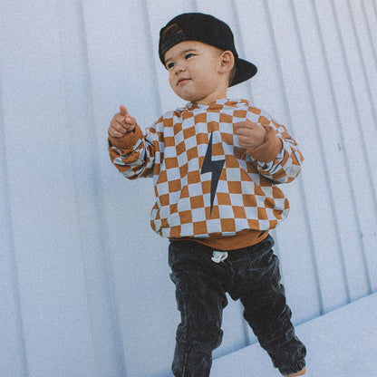 THE CHECKERED SPARK HOODIE - RUST